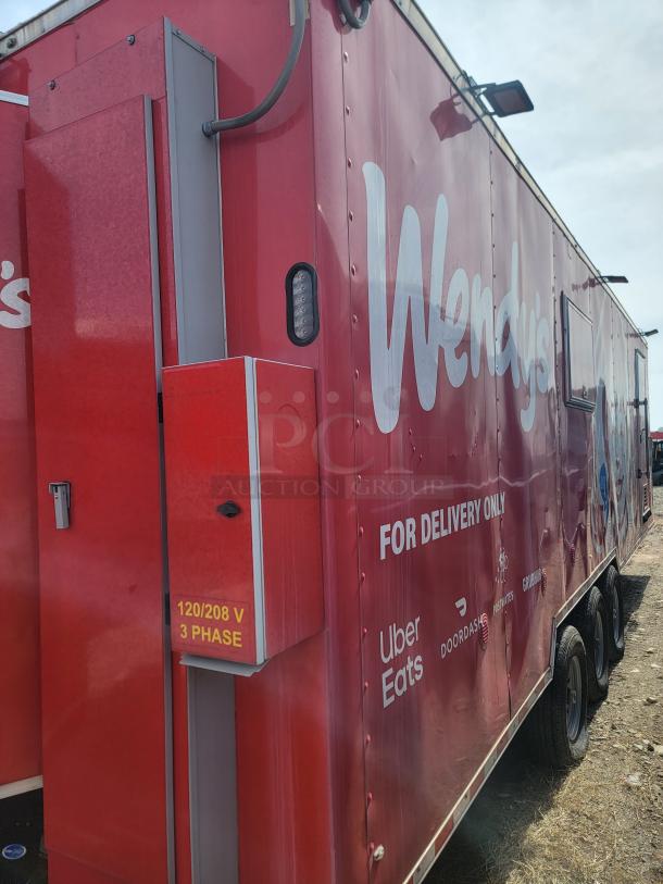 Red Wendy's delivery trailer, branded for Uber Eats, DoorDash, 120/208V 3-phase power, in used condition.