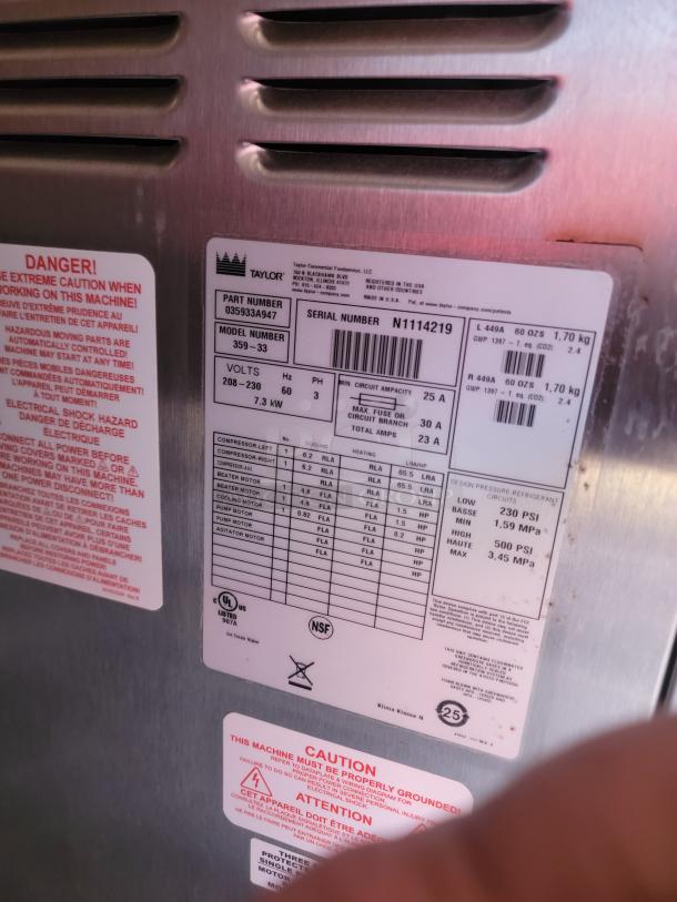 Taylor commercial machine panel with model number 359-33 and serial number N1114219; shows electrical and refrigerant specs.