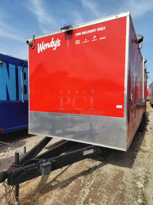 Red Wendy's food trailer for delivery only, featuring Uber Eats, DoorDash logos. Steel frame, good condition, visible hitch.