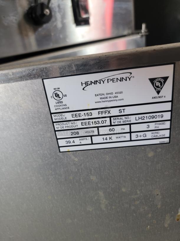 Henny Penny cooking appliance, Model EEE-153, Serial LH2109019, 208V, 60Hz, 39.4A, 14KW; listed UL. Made in USA.