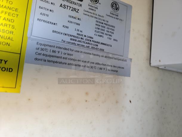 Refrigerator label showing model AST72RZ, R290 refrigerant, 3.35 oz, made by Broich Enterprises, designed for under 30°C.