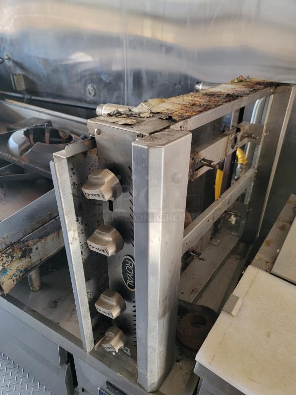 Royal commercial kitchen appliance with visible rust and damage. Features metal knobs and logo. Used condition.