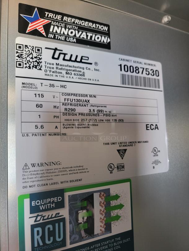 True T-35-HC refrigerator label detailing model, serial number 10087530, R290 refrigerant, and warning about chemicals.