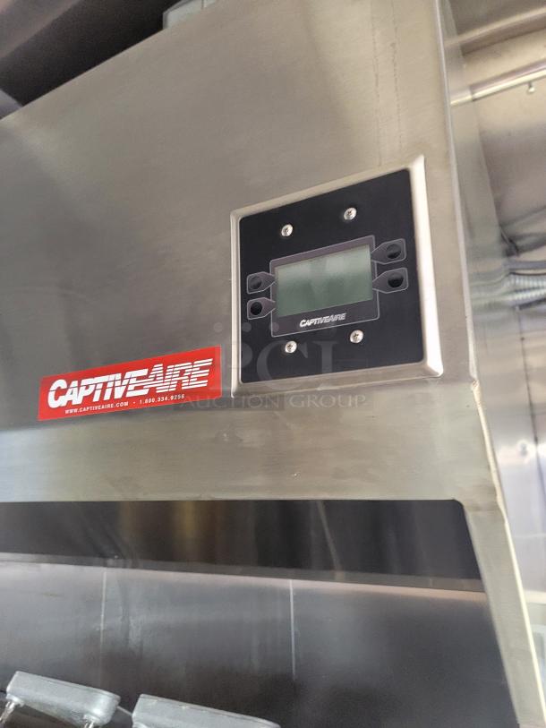 CaptiveAire commercial ventilation system with digital control panel; stainless steel, pristine condition, branded label visible.