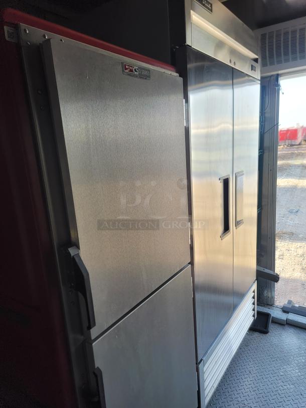 Commercial stainless steel refrigerator with double doors, Metro C5 Series. Used condition, minor surface wear.
