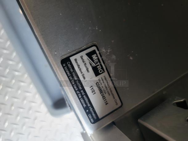 Metal equipment with Metro brand label displaying model number C5HMES0343-114 and manufacture date 11/2021.