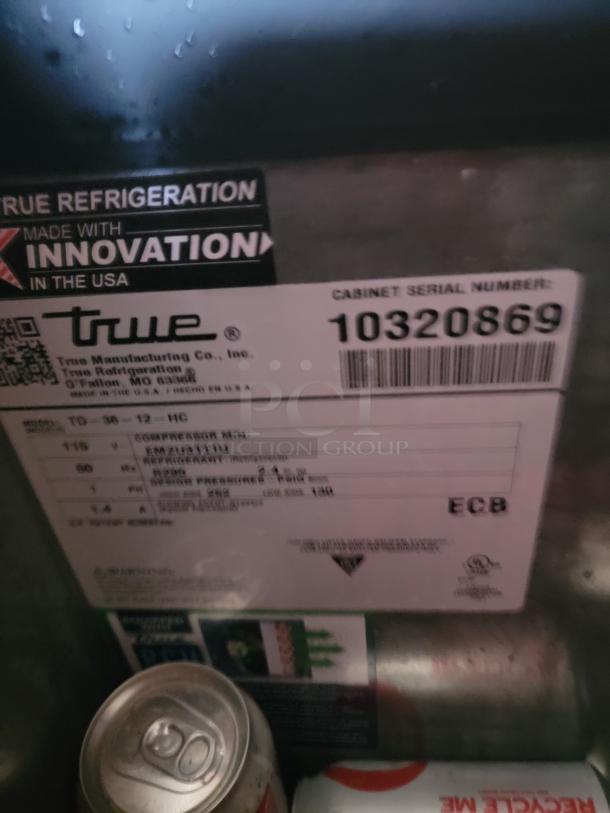 Label on True Refrigeration unit with serial number 10320869. Includes model TD-36-12-HC and compressor details.