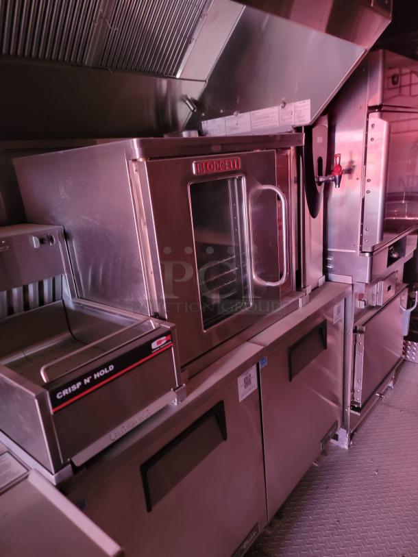 Blodgett convection oven and Crisp N' Hold unit in stainless steel, excellent condition, visible brand and caution labels.