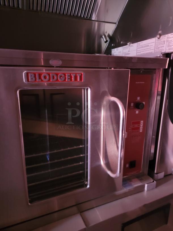 Blodgett stainless steel convection oven, glass door, control panel on the right. Good condition, commercial use.