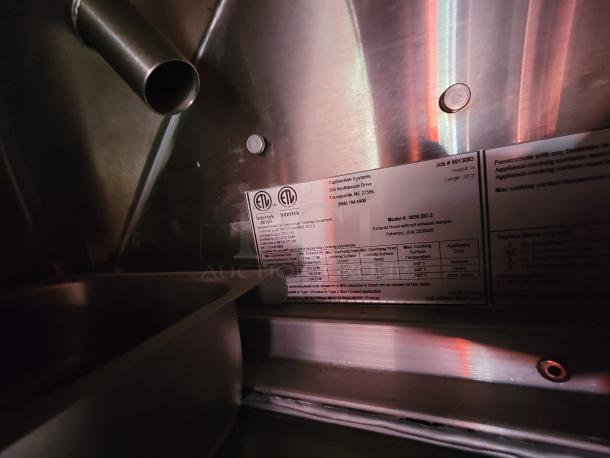 Industrial stainless steel exhaust hood, CaptiveAire Systems label visible. Model: 3650 BD-2, excellent condition.