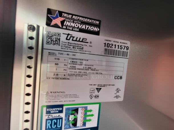 True Refrigeration label showing model TUC-48-HC details, serial number 10211579, and specifications including compressor info.