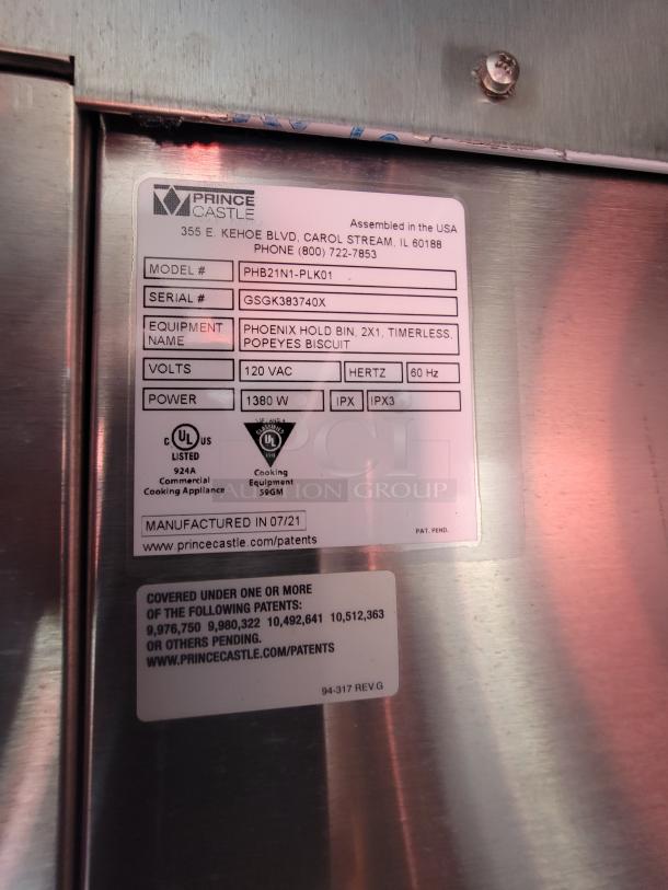 Prince Castle Phoenix Hold Bin, model PHB21N1-PLK01 with serial GSGK383740X. 120VAC, 1380W. Assembled 07/21, for Popeyes Biscuit.
