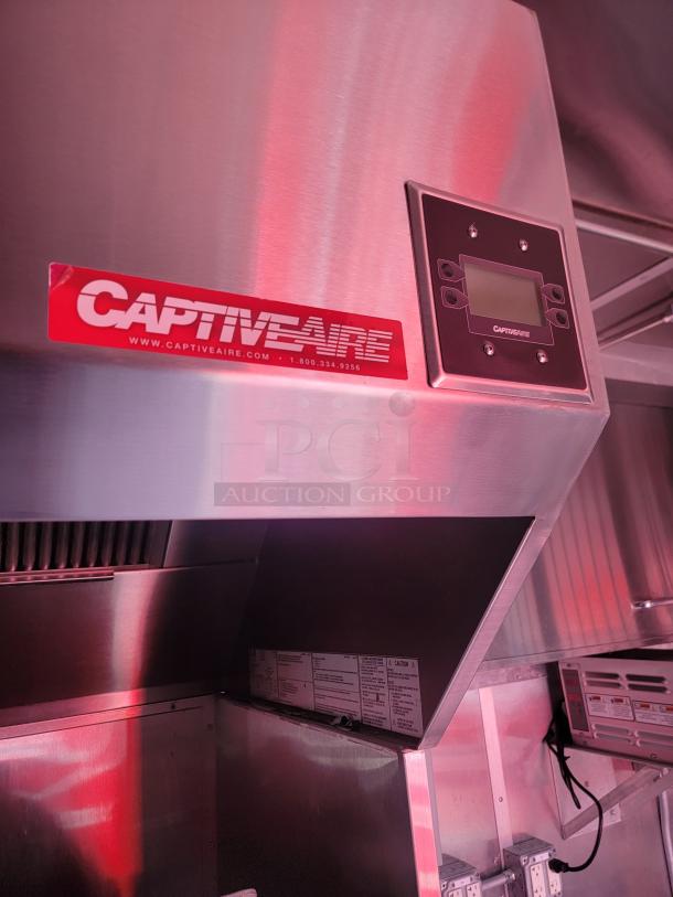 CaptiveAire commercial kitchen hood with control panel, stainless steel, excellent condition, visible branding and labels.