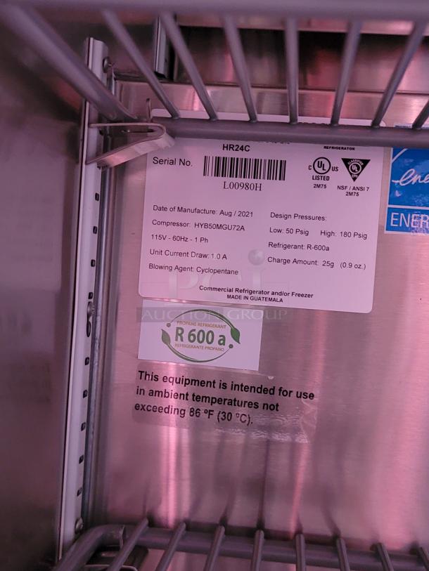 Commercial refrigerator/freezer label, model HR24C, serial L00980H. Made Aug 2021. Uses R-600a refrigerant, 115V, 1.0A.