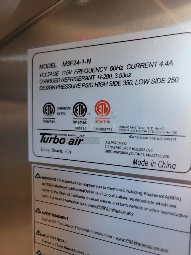 Turbo Air refrigerator model M3F24-1-N, 115V, R-290 refrigerant, made in China. ETL certified. Warning label included.