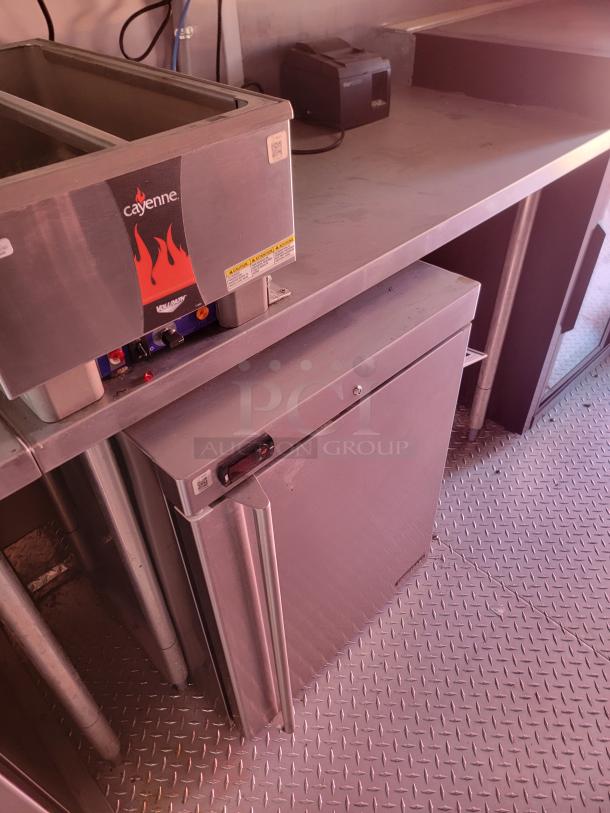 Cayenne commercial food warmer with stainless steel construction, model features a two-compartment design, good condition.