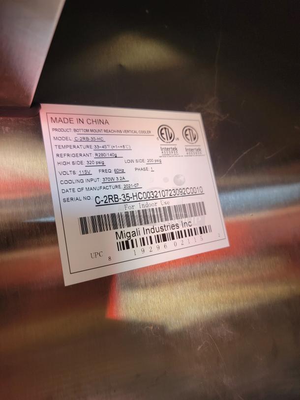 Migali Industries cooler label showing model C-2RB-35-HC, temperature range 33-45°F, refrigerant R290, manufactured 2021.