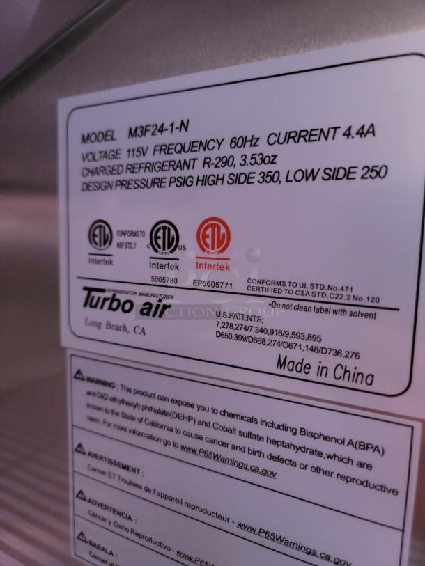 Label on Turbo Air Model M3F24-1-N refrigerator. Shows voltage 115V, frequency 60Hz, refrigerant R-290, made in China.