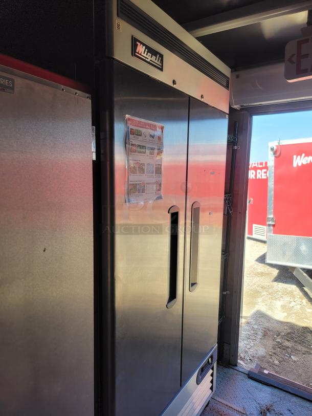 Migali commercial refrigerator, stainless steel, double-door, prominent logo, attached flyer, excellent condition.