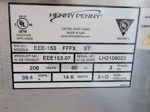 Henny Penny model EEE-153 label indicates 208V, 60Hz, 3-phase, 39.4 amps, 14kW, UL listed cooking appliance. Serial no. LH2109023.