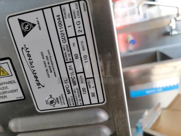 Henry Penny Model MPC-1L appliance label showing specs: 120V, 110W, Serial GD21100044, UL certified, made in USA.