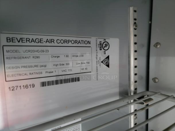 Beverage-Air Corporation refrigerator model UCR20HC-09-23 label, showing refrigerant R290, electrical ratings, and serial number 12711619.