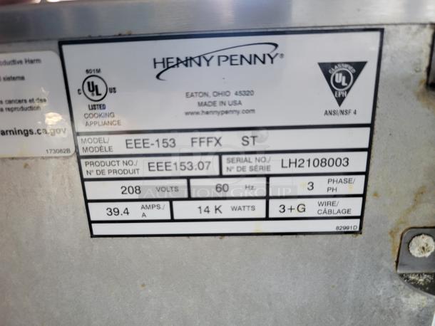 Henny Penny cooking appliance label; model EEE-153, 208 volts, 60 Hz, 3-phase, 14kW, serial LH2108003, made in USA.