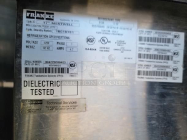 Franke refrigeration unit specification label showing serial number 304220000403, 120V, 60Hz, manufactured on 03/30/22.