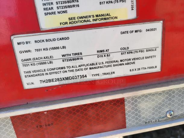 Rock Solid Cargo trailer label showing GVWR 7031 KG, tire size ST235/80/R16, and manufacturing date 04/2021.