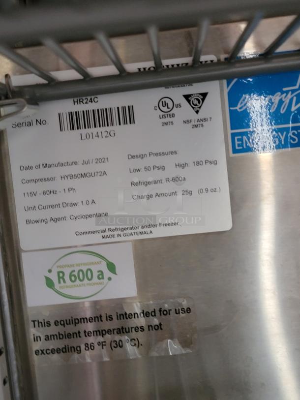 Commercial refrigeration unit label showing model HR24C, manufactured July 2021, using R-600a refrigerant.