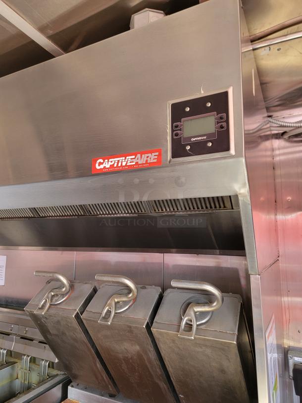 CaptiveAire commercial kitchen ventilation hood with digital control panel, stainless steel finish, in good condition.