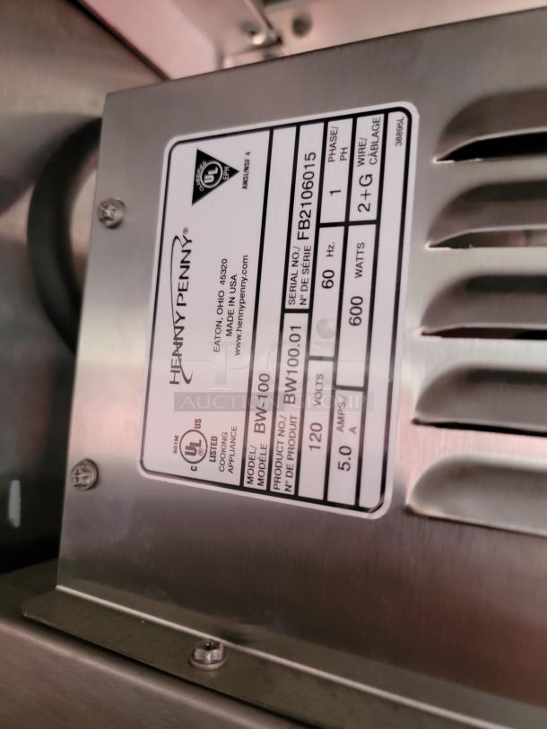 Henry Penny BW-100 cooking appliance label, UL certified, 120V, 600W, model BW100.01, serial FB2106015, made in USA.