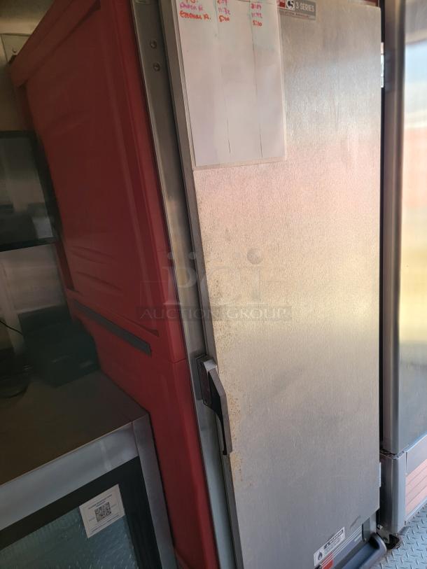 Commercial refrigerator, Silver King SK3M Series, stainless steel finish, visible wear, notes on paper attached, used condition.