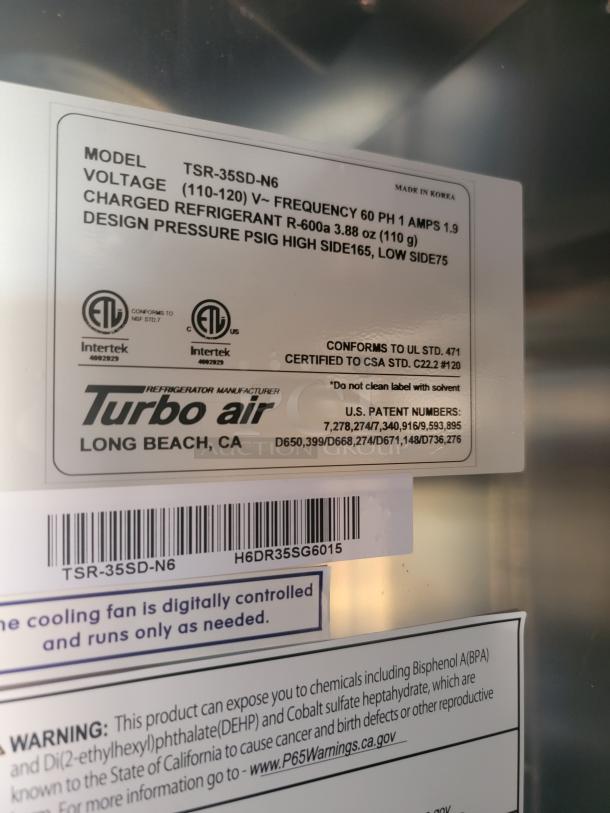 Turbo Air TSR-35SD-N6 refrigerator label detailing model, voltage, refrigerant, design pressure, and digital cooling fan info.