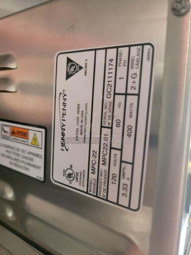 Henny Penny MPC-22 cooking appliance label, model MPC22.01, 400 watts, 120 volts, serial GC2111174.