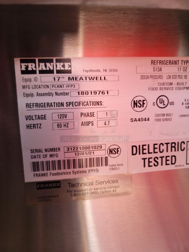 Franke 17" Meatwell refrigeration unit ID tag; specs: 120V, 60Hz, 4.7 Amps, serial 312210001029, manufactured 12/01/21.