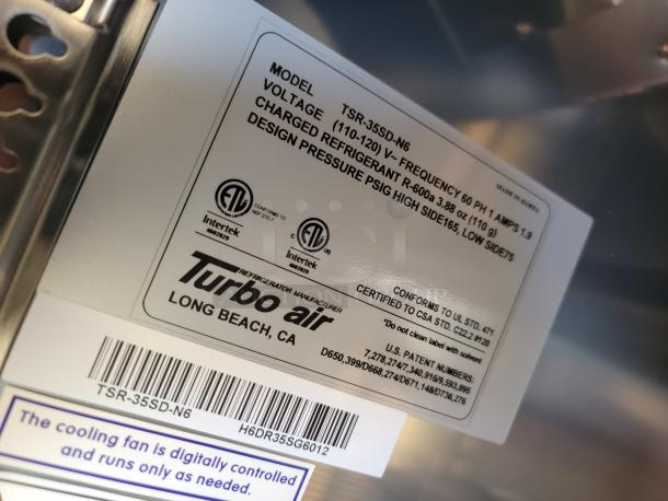Turbo Air TSR-35SD-N6 label showing model, voltage, refrigerant details, and compliance marks. Made in Korea.