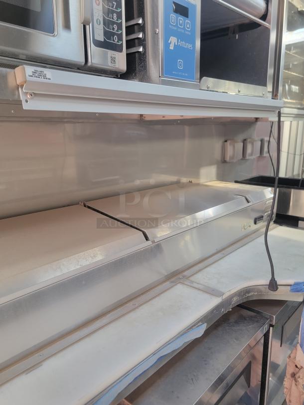 Antunes kitchen equipment with visible branding, showing stainless steel casing and control panel. Used condition.