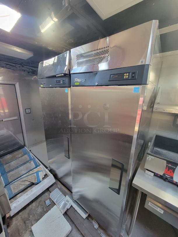 Stainless steel Turbo Air commercial refrigerators, side by side, with digital displays, in good condition; no visible VIN.