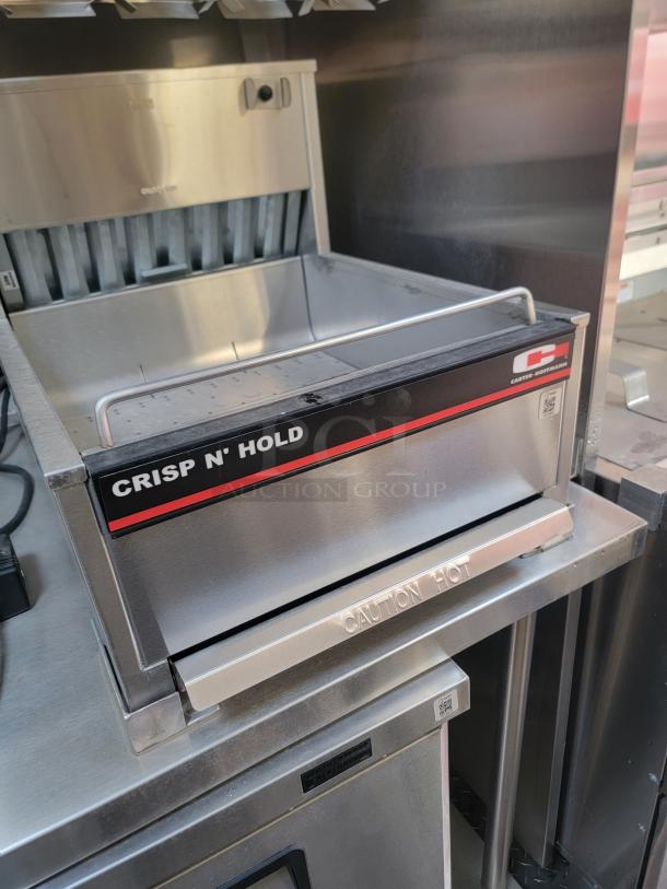 Carter-Hoffmann Crisp N' Hold food station, stainless steel, "CAUTION HOT" label, excellent condition.