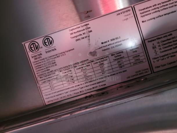 Label on CaptiveAire Systems exhaust hood model 3650 BD-2. Lists cooking surface temperatures and specifications.