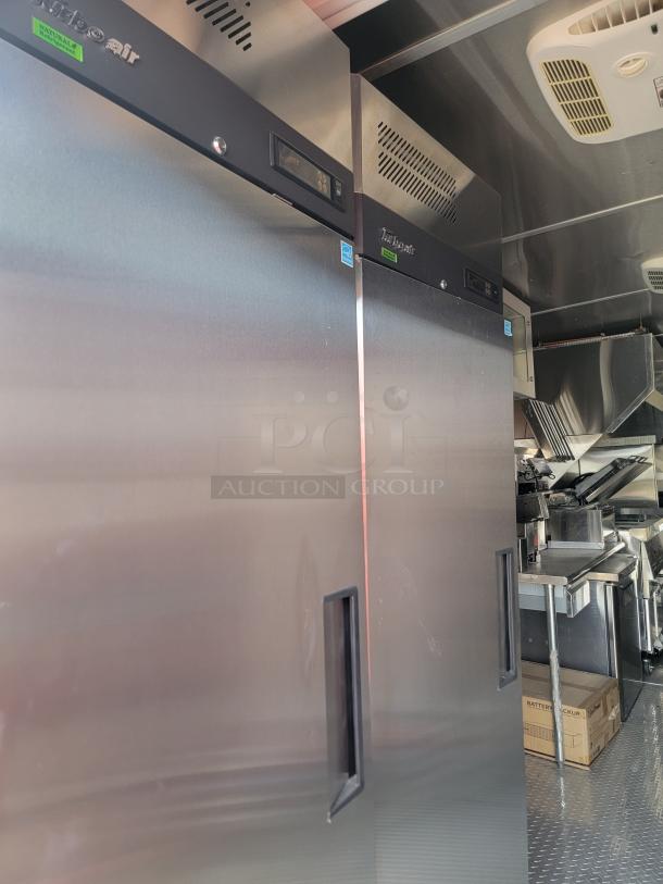 Two Turbo Air stainless steel commercial refrigerators in excellent condition, with digital controls and visible branding.