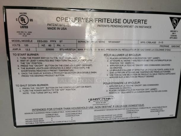 Henny Penny EEG-253 open fryer label, showing model, serial number NF2204007, voltage 120V, made in USA. Gas-fired, UL listed.
