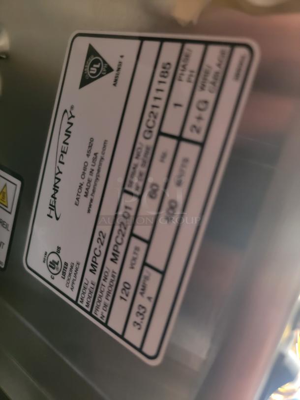Henny Penny MPC-22 appliance label, UL listed, 120 volts, 3.33 amps, 400 watts, serial GC21111185, Made in USA.