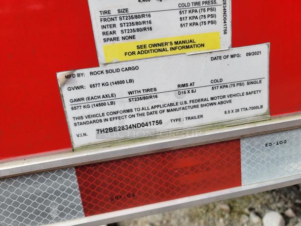 Rock Solid Cargo trailer label, dated 09/2021. GVWR 6577 kg, VIN 7H2BE2834ND041756. Tire size ST235/80/R16.