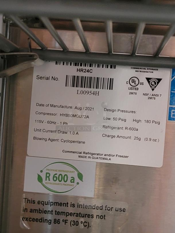 Commercial refrigerator label, model HR24C. Manufactured Aug 2021, uses R-600a refrigerant. Serial L00954H, made in Guatemala.