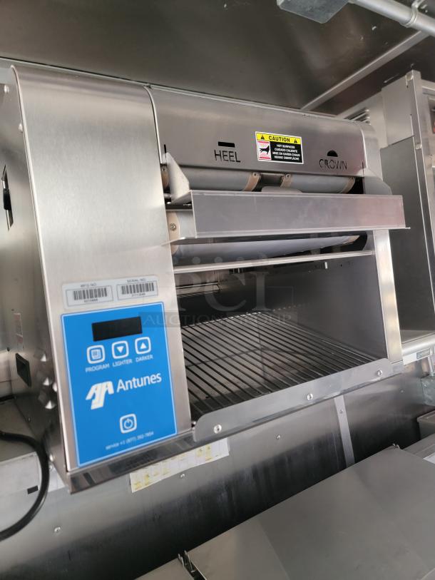 Antunes commercial toaster, stainless steel, digital controls, labeled "HEELS" and "CROWN," new condition.