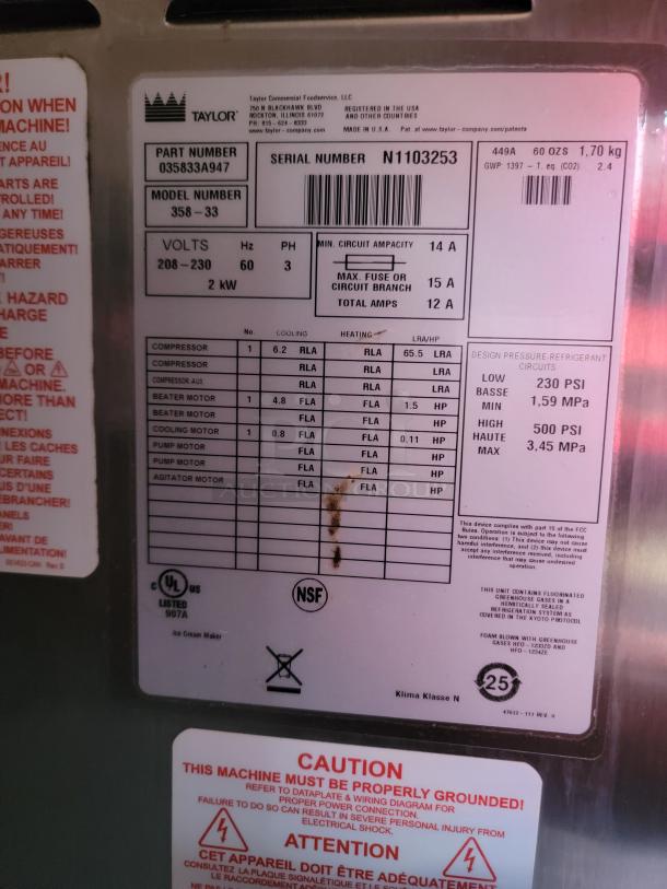 Taylor commercial ice cream maker label, Model 358-33, Serial N1103253. Voltage: 208-230V, 60Hz, 3PH, 2kW. UL and NSF certified.