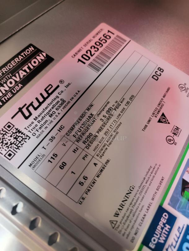 Label on True Manufacturing refrigeration unit, model T-35-HC. Serial number 10239561, uses refrigerant R290, 115V, 60Hz.