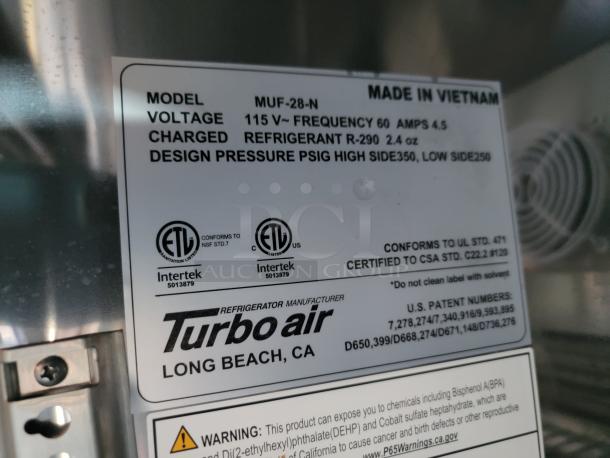 Turbo Air model MUF-28-N label showing voltage, refrigerant type, design pressure, certifications, and patent numbers. Made in Vietnam.